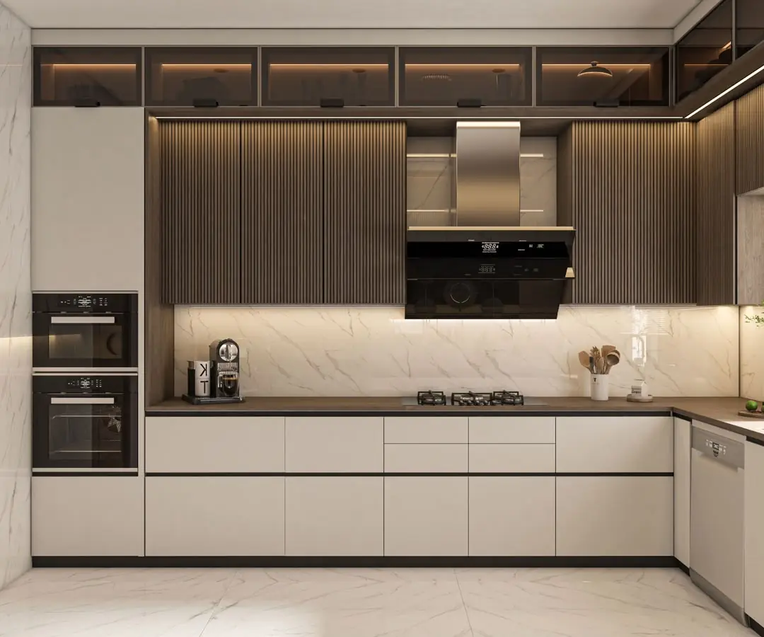 Kitchen with fluted wood wall cabinets, lit glass display units, built-in ovens and a marble-look splashback